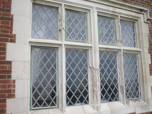 Badly corroded stone window frame