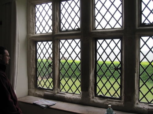 Internal view of damaged stone window frame.